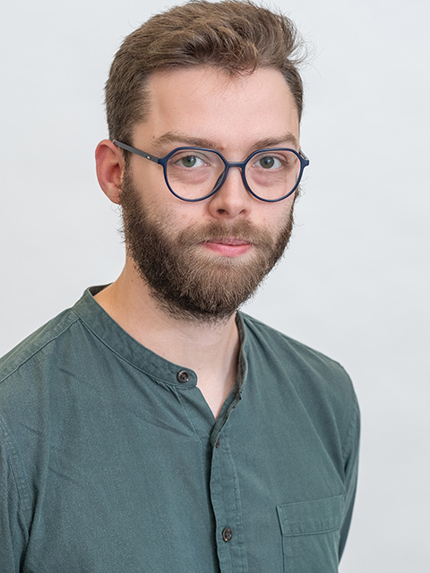 Portrait photograph of Doctoral Research staff member, Max Eastwood